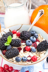 Healthy breakfast with granola and fresh berries