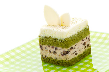 Fototapeta na wymiar Matcha green tea cake isolated on white background