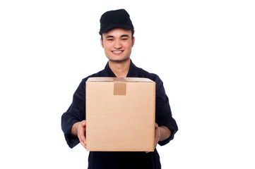Young boy delivering parcel safely