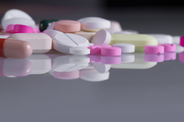 Obraz na płótnie Canvas Pile of various colorful pills