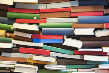 stack of books in a library