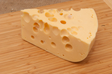 cheese on a wooden board