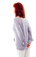 Rear view of a mature woman thinking with her hands behind back