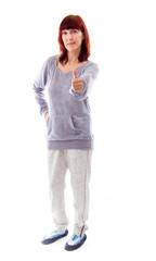 Mature woman showing thumbs up sign