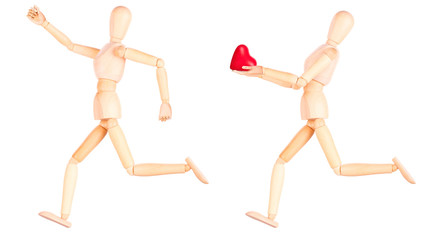 wooden Dummy holding red heart