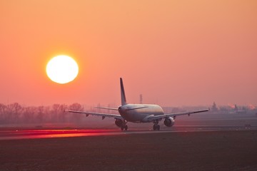 Fototapeta na wymiar Airport at the sunset