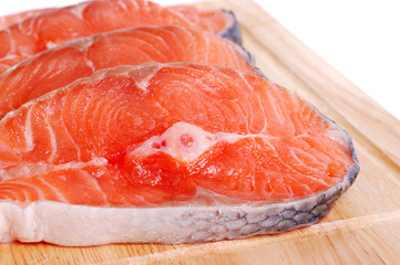 Salmon on wooden board