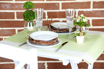 Beautiful holiday Easter table setting in green tones,