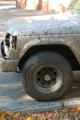 Fototapeta premium car wheel in mud