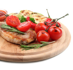 Grilled steak with spices, herbs and vegetables
