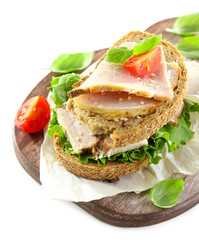 Delicious sandwiches with meet isolated on white