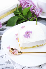 Fototapeta na wymiar Delicious dessert with lilac flowers