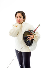 Female fencer looking sad with a holding mask and sword
