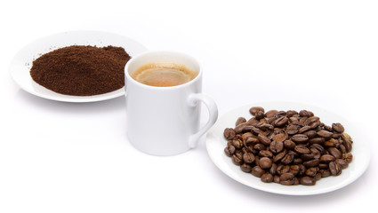 Coffee powder with a cup of coffee