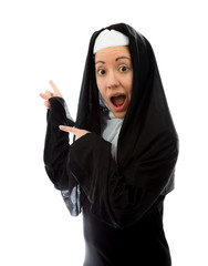 Young nun showing something