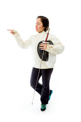 Female fencer holding a mask and sword with pointing up