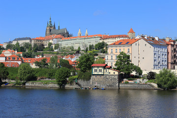 Fototapeta premium View on the spring Prague gothic Castle above River Vltava