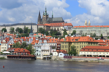 Obraz premium View on the spring Prague gothic Castle above River Vltava