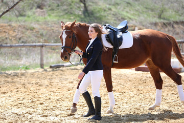 Fototapeta premium Beautiful girl with horse outdoors