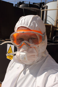 Industrial Cleaner Wearing His Full Ppe