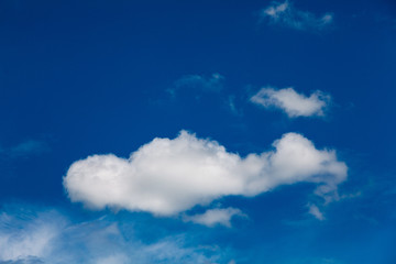 Fototapeta na wymiar Set of white clouds over blue