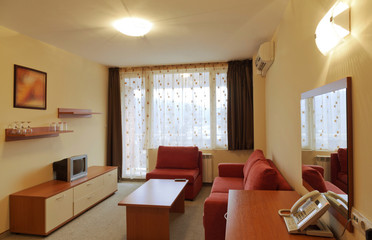 Interior Design: modern small hotel room with tv