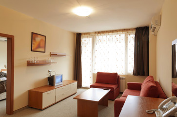 Interior Design: modern small hotel room with tv
