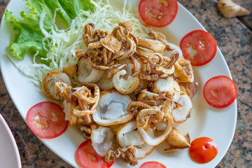 Fried or grilled squid with egg