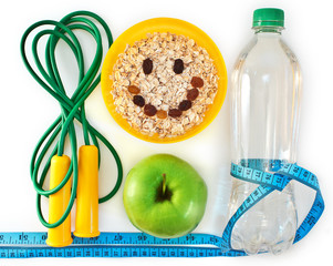 Bottle of water, muesli and green apple. Attributes of a healthy - 64650146