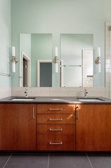 Vanity double sink and mirrors in modern bathroom