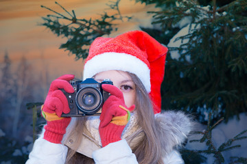 Santa girl with SLR camera