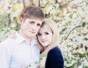 young beautiful  couple in spring gadren