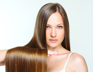 Fototapeta premium Beautiful Woman with Healthy Long Hair