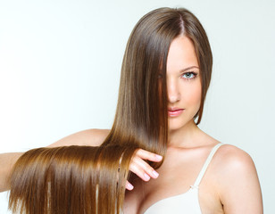 Fototapeta premium Beautiful Woman with Healthy Long Hair
