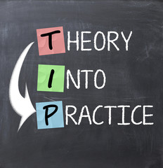 Theory into practice text on a blackboard - obrazy, fototapety, plakaty