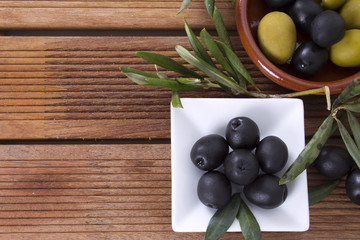 olives with wooden background