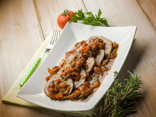 roasted meat with tomatoes