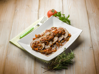 roasted meat with tomatoes