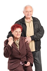 Elderly couple posing together