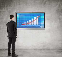 man looking at chart