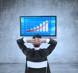 man looking at chart