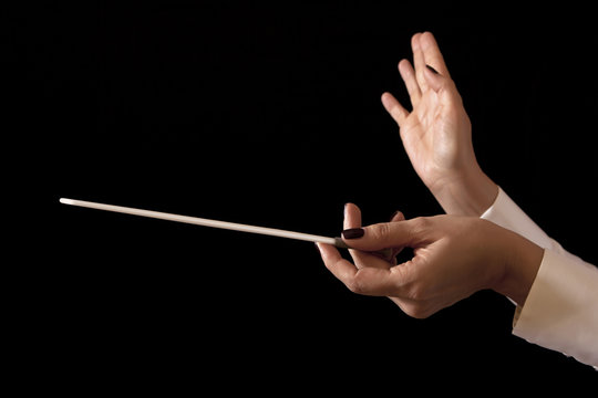 Music director holding stick