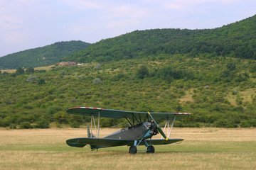 Old-fashioned biplane landed © acceptfoto