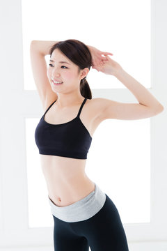 young asian woman exercise image