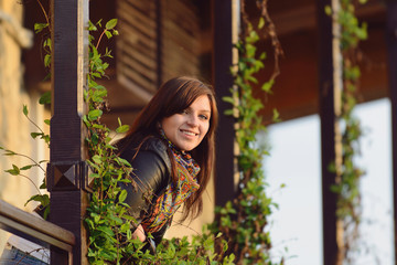 Smiling Girl on Wooden Porch