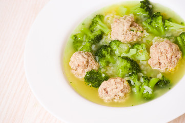 Soup with meatballs, rice and vegetables