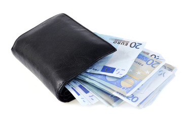 Le portefeuille plelin de billets de banque