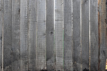 Grey wooden fence, close-up