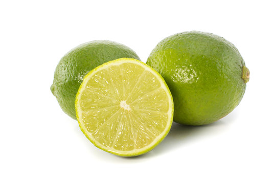 Lime and a slice isolated on white