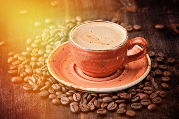 Coffee. Cup of espresso and coffee beans